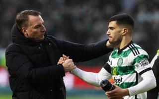 Celtic manager Brendan Rodgers, left, shakes Liel Abada's hand after his side's win over Rangers at Parkhead in December