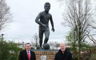 South Lanarkshire Council leader Joe Fagan, left, with ex-Rangers captain Davie Mackinnon at the refurbished Davie Cooper statue in the grounds of Hamilton Palace