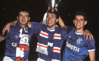 Derek Ferguson, left, Ally McCoist, centre, and Ian Durrant, right, celebrate Rangers' win over Celtic in the League Cup final in 1986