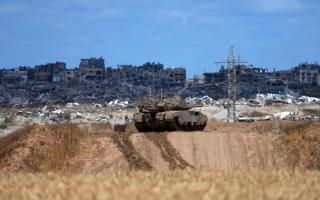 An Israeli tank overlooks the Gaza Strip