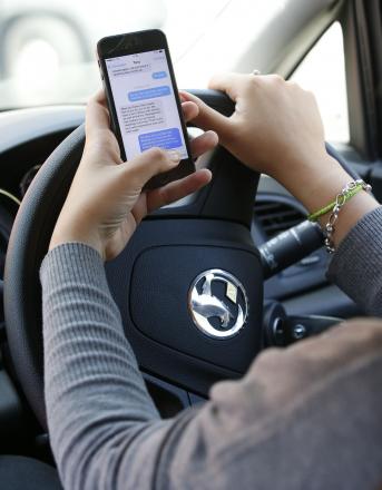 Technology 'putting millions of distracted drivers in danger'