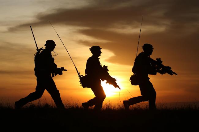 Soldiers on patrol. Hundreds of British troops are to be deployed to eastern Europe as part of a show of strength by Nato in the face of an increasingly assertive Russia. (Andrew Milligan/PA Wire)