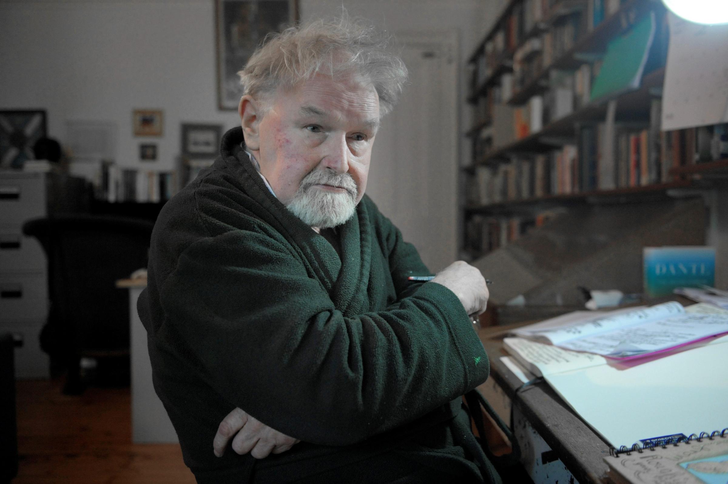 A capital idea: Alasdair Gray working on a mural to adorn the Scottish Parliament, as first London show revealed