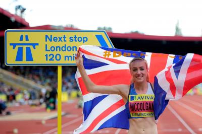 The sign says it all . . . Eilish McColgan celebrates victory in the 3000m steeplechase at the Olympic Trials. Picture: Jamie McDonald/Getty