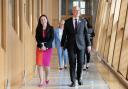 First Minister of Scotland John Swinney and Deputy First Minister Kate Forbes arrive at the Scottish Parliament