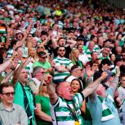 The Celtic fans celebrate