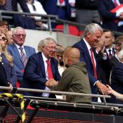 Sir Alex Ferguson greets Manchester City manager Pep Guardiola (Nick Potts/PA)