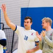 Ben Tyler, centre, shares his love of sport with his patients (England Handball/PA)