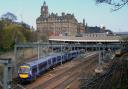 Two charged over boy falling onto electricity lines at Edinburgh Waverley