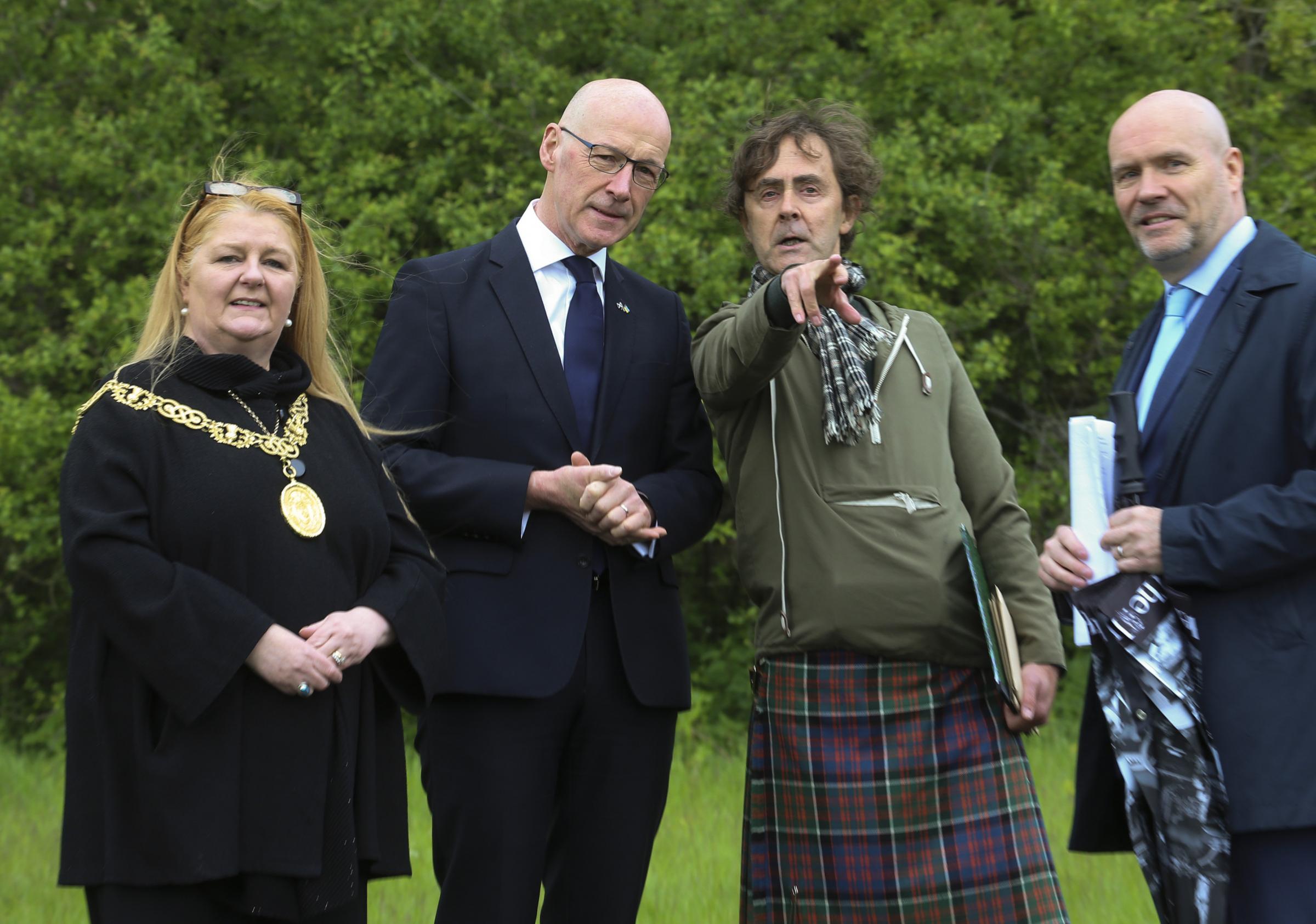 Deputy First Minister John Swinney also laid a wreath and joined families on a silent walk. From left, Glasgows Lord Provost Jacqueline McLaren, Mr Swinney, artist Alec Findlay and Donald Martin, Editor of The Herald. Photo Gordon Terris.