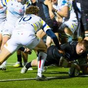 Johnny Matthews crosses for a Glasgow try