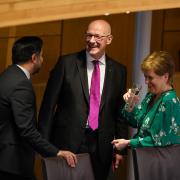 Five, six, seven: John Swinney chats to predecessors Humza Yousaf and Nicola Sturgeon ahead of the vote for FM in Holyrood