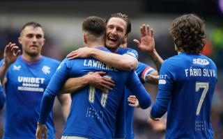 Ben Davies celebrates scoring his first goal for Rangers with his team mates at Ibrox this afternoon