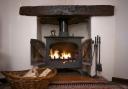 Might wood-burning stoves produce less CO2 than heat pumps? Burning questions