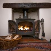 Might wood-burning stoves produce less CO2 than heat pumps? Burning questions