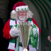 Santa appears with the League Trophy