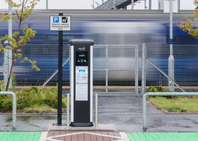 Installing more electric car chargers - such as this one at Bathgate station - will cost billions, according to a new report.
