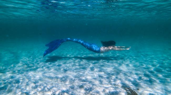 Kate Macleod living her dream as a mermaid off the coast of Lewis.