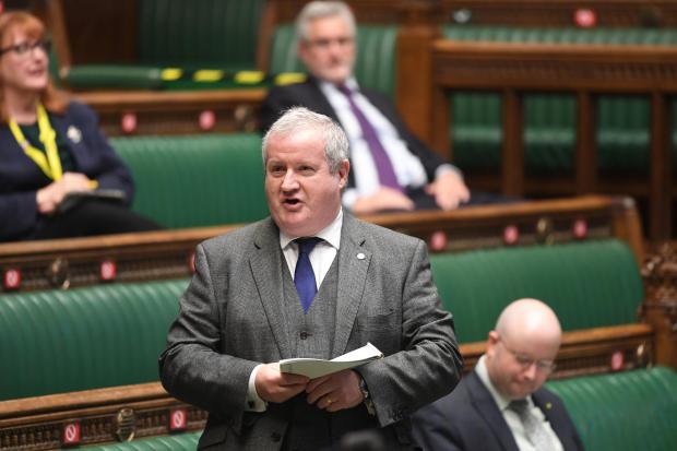 Ian Blackford speaking in the House of Commons with Patrick Grady sittting to his right.   File picture.