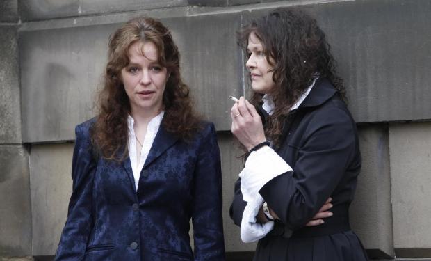 HeraldScotland: Corinne Mitchell (right), mother of convicted killer Luke Mitchell with Sandra Lean (left) outside Edinburgh High Court after Corinne's son was refused leave to take his attempt to have his conviction overturned to the UK's highest court.