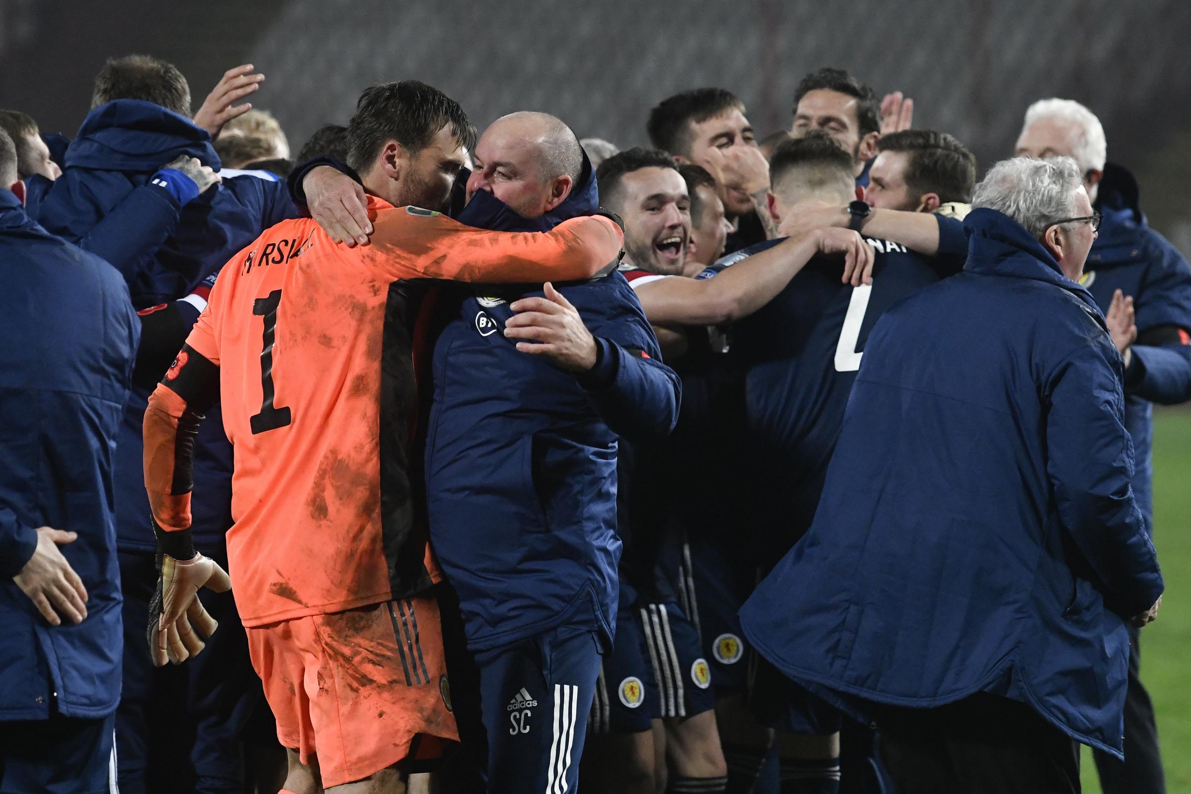 Steve Clarke, Head Coach of Scotland celebrates with David Marshall of Scotland after the UEFA EURO 2020 Play-Off Final between Serbia and Scotland at Rajko Mitic Stadium 