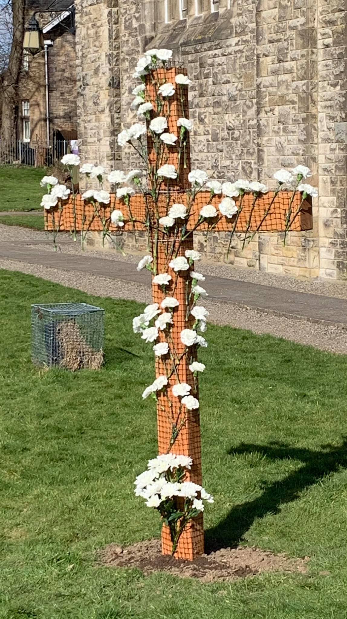 A remembrance cross in the grounds of Cathcart Old Parish Church