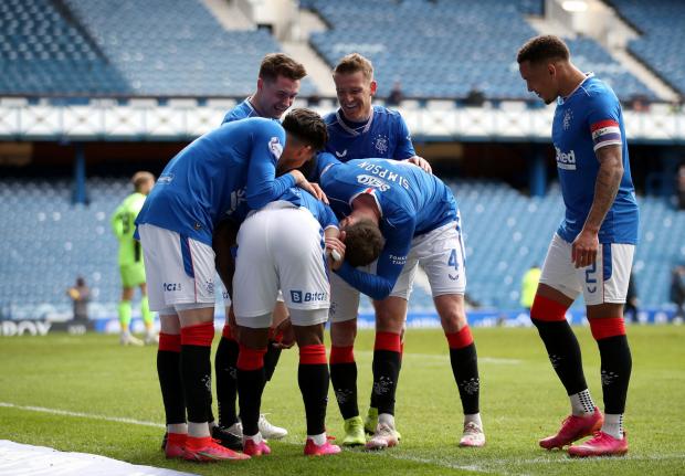 HeraldScotland: Rangers' Jermain Defoe celebrates scoring their side's fourth goal of the game with teammates during the Scottish Premiership match at Ibrox 