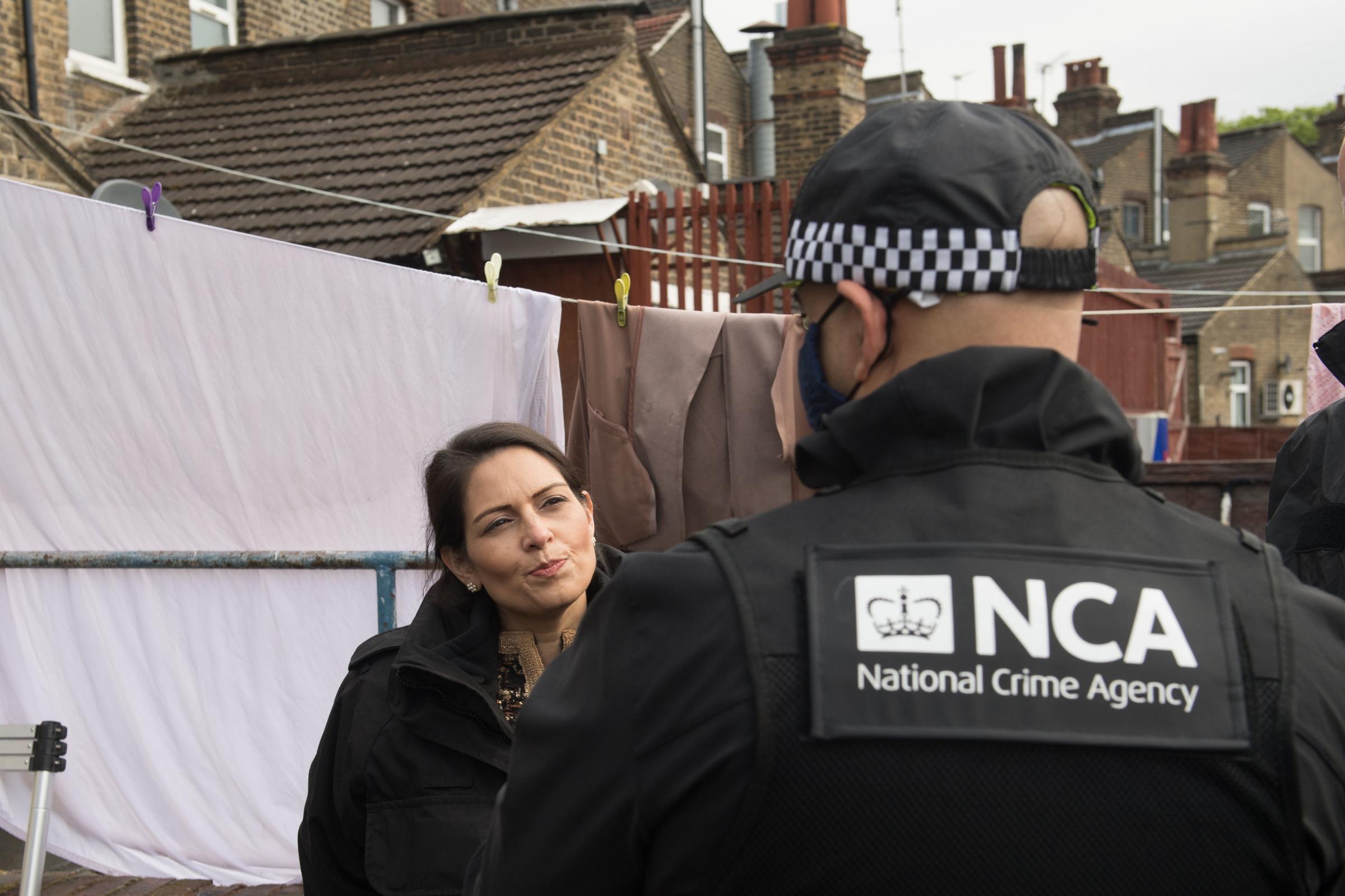 Home Secretary Priti Patel during a National Crime Agency operation at address in east London Picture: Stefan Rousseau/PA Wire 