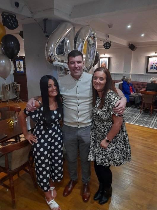 James Grant celebrates his 40th birthday with sisters Michelle Grant and Annemarie Barghati