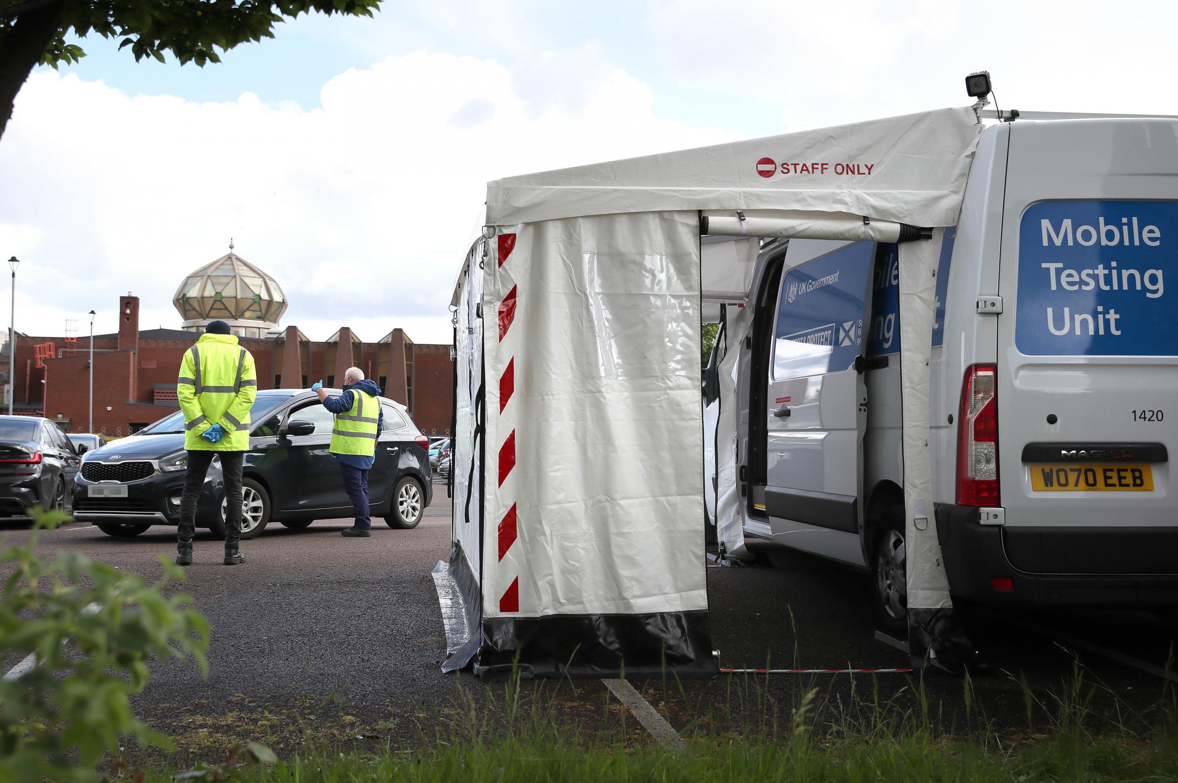 Staff from the Scottish Ambulance Service run a Covid Mobile Testing Unit in the car park of the Glasgow Central Mosque Picture: Andrew Milligan/PA Wire