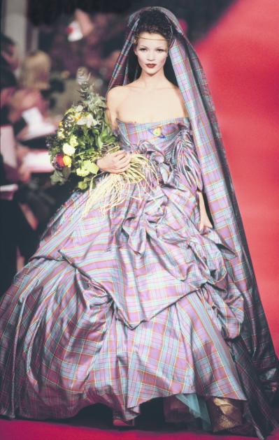 Kate Moss in a tartan wedding gown for Vivienne Westwood's Autumn/ Winter  1993 'Anglomania' collection! This gorgeous wedding gown was the…