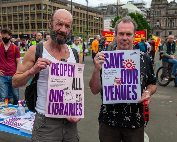 HeraldScotland: George Square libraries protest. Actors Tam Dean Burn and Gavin Mitchell attended
