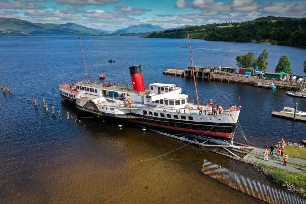 HeraldScotland: The Maid of the Loch winching operation was watched by a big crowd of spectators - many of them volunteers with the ship (Photo - Jeff J. Mitchell/Getty Images)