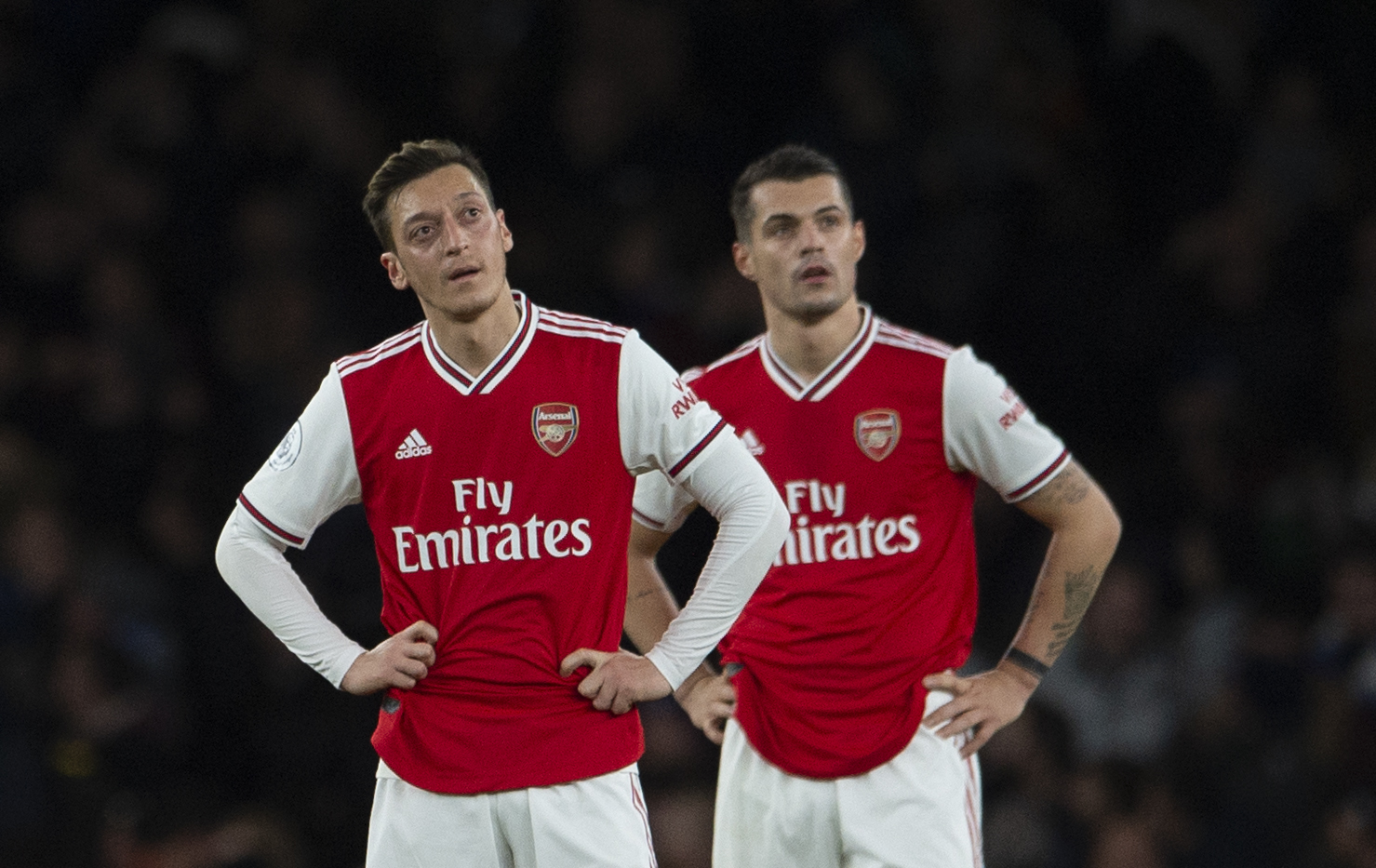 Granit Xhaka, right, has been handed a new contract despite suggestions he wanted to leave Arsenal this summer
