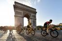 Team Ineos Egan Bernal cycles past the Arc De Triomphe during stage 21 of the Tour de France during stage 21 of the Tour de France. PRESS ASSOCIATION Photo. Picture date: Sunday July 28, 2019. See PA story CYCLING Tour. Photo credit should read: PA Wire.