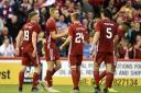 
Aberdeen's Sam Cosgrove (second left) celebrates scoring his side's fifth goal of the game the UEFA Europa League second qualifying round second leg at Pittodrie Stadium, Aberdeen. PRESS ASSOCIATION Photo. Picture date: Thursday August 1, 2019. S