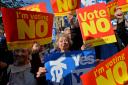 Yes and No voters protest as John Prescott and Alistair Darling join the Scottish Labour Battle Bus on Rutherglen main street on September 10, 2014 in Glasgow.