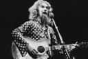 Scottish comedian and folk singer Billy Connolly performing at the New Victoria Theatre (now the Apollo Victoria Theatre), London, 15th October 1975. (Photo by Michael Putland/Getty Images).