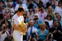 File photo dated 07-07-2013 of Great Britain's Andy Murray celebrates with his trophy after defeating Serbia's Novak Djokovic during day thirteen of the Wimbledon Championships at The All England Lawn Tennis and Croquet Club, Wimbledon. PA Photo.