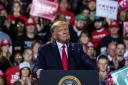 While the Democrats impeached him in Washington DC, Donald Trump addressed supporters in Battle Creek, Michigan. Pic: Matthew Hatcher/SOPA Images/ZUMA Wire/Alamy Live News
