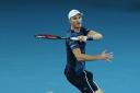 Jamie Murray in action with mixed doubles partner Bethanie Mattek-Sands