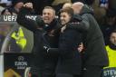 Rangers manager Steven Gerrard celebrates with his coaching staff during the Europa League last 32 first leg match between Rangers and Braga