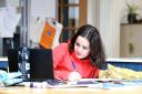 Sophie Symes, a young pupil, studies at home after many schools across the UK switched to online learning. Photo: PA