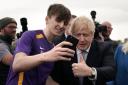Prime Minister Boris Johnson has a selfie taken in Hartlepool, following MP Jill Mortimer's victory in the Hartlepool parliamentary by-election