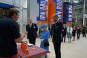 The Duke of Cambridge, known as the Earl of Strathearn in Scotland, tries Irn-Bru as Queen Elizabeth II looks on. Andrew Milligan (PA)