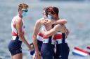 Great Britain’s Harry Leask, Angus Groom, Tom Barras and Jack Beaumont celebrate winning silver in the men’s quadruple sculls