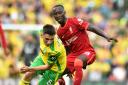 NORWICH, ENGLAND - AUGUST 14: (THE SUN OUT,THE SUN ON SUNDAY OUT) Naby Keita of Liverpool with Billy Gilmour of Norwich City  during the Premier League match between Norwich City  and  Liverpool at Carrow Road on August 14, 2021 in Norwich, England.