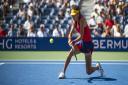 NEW YORK, NEW YORK - SEPTEMBER 08:  Emma Raducanu of Great Britain hits a backhand against Belinda Bencic of Switzerland in the quarter finals of the womenâ€™s singles at the US Open at the USTA Billie Jean King National Tennis Center on September