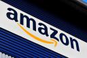Amazon extends use of Visa credit cards in UK in bid to resolve payment dispute. (PA)
