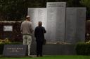 Relatives pause at the Lockerbie memorial